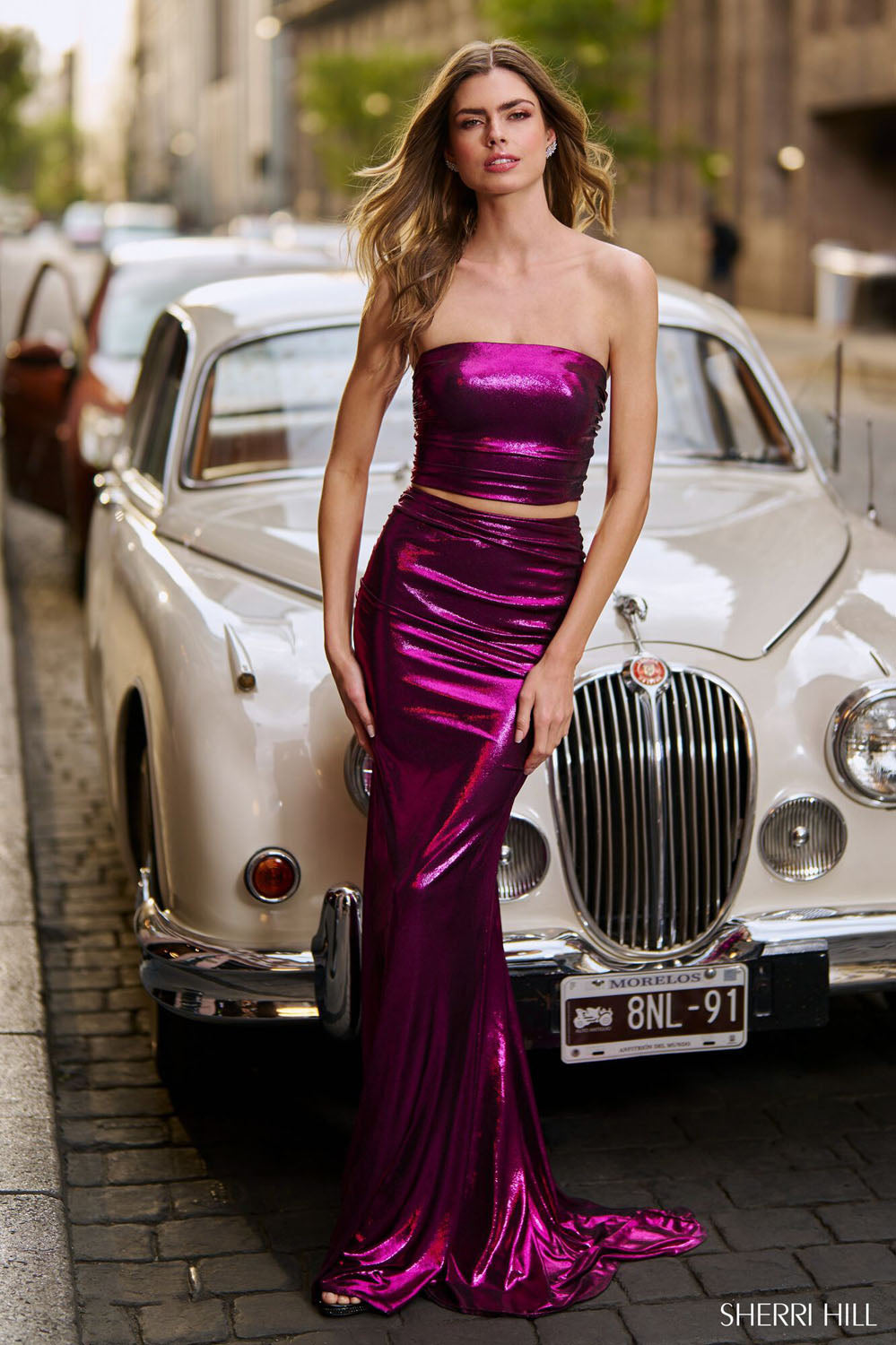 Sherri Hill 56626 prom dress images. Sherri Hill 56626 is available in these colors: Rose Gold, Silver, Fuchsia, Royal, Emerald, Peacock, Lilac, Gunmetal, Gold, Mocha, Chartreuse, Black.