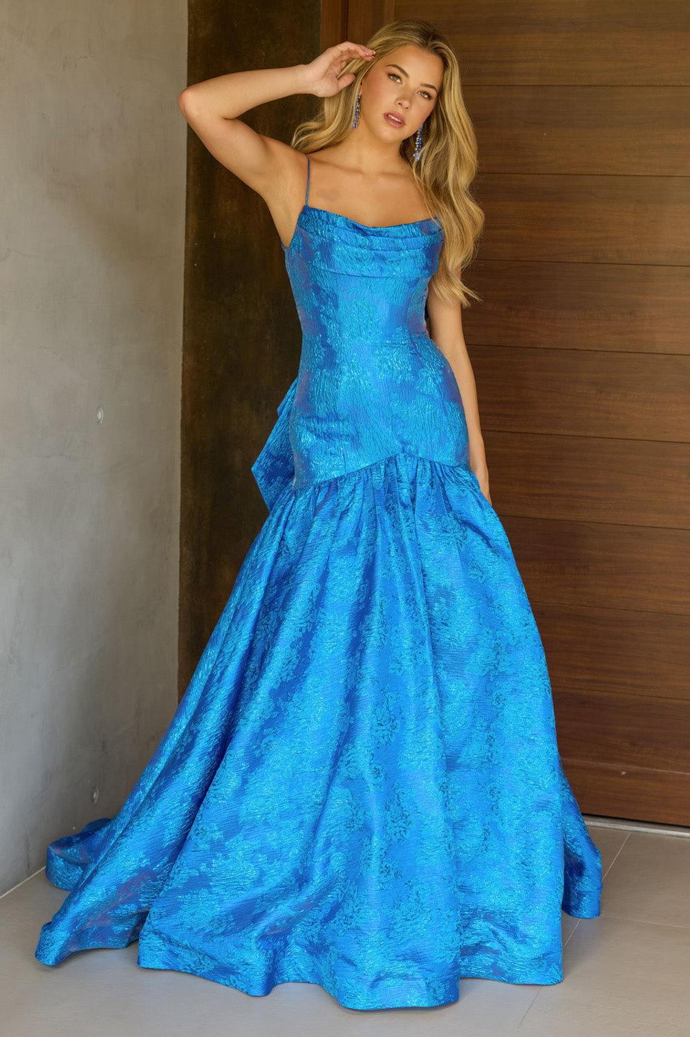 Ava Presley 26419 Royal blue mermaid prom dress with a cowl neckline and dramatic train.