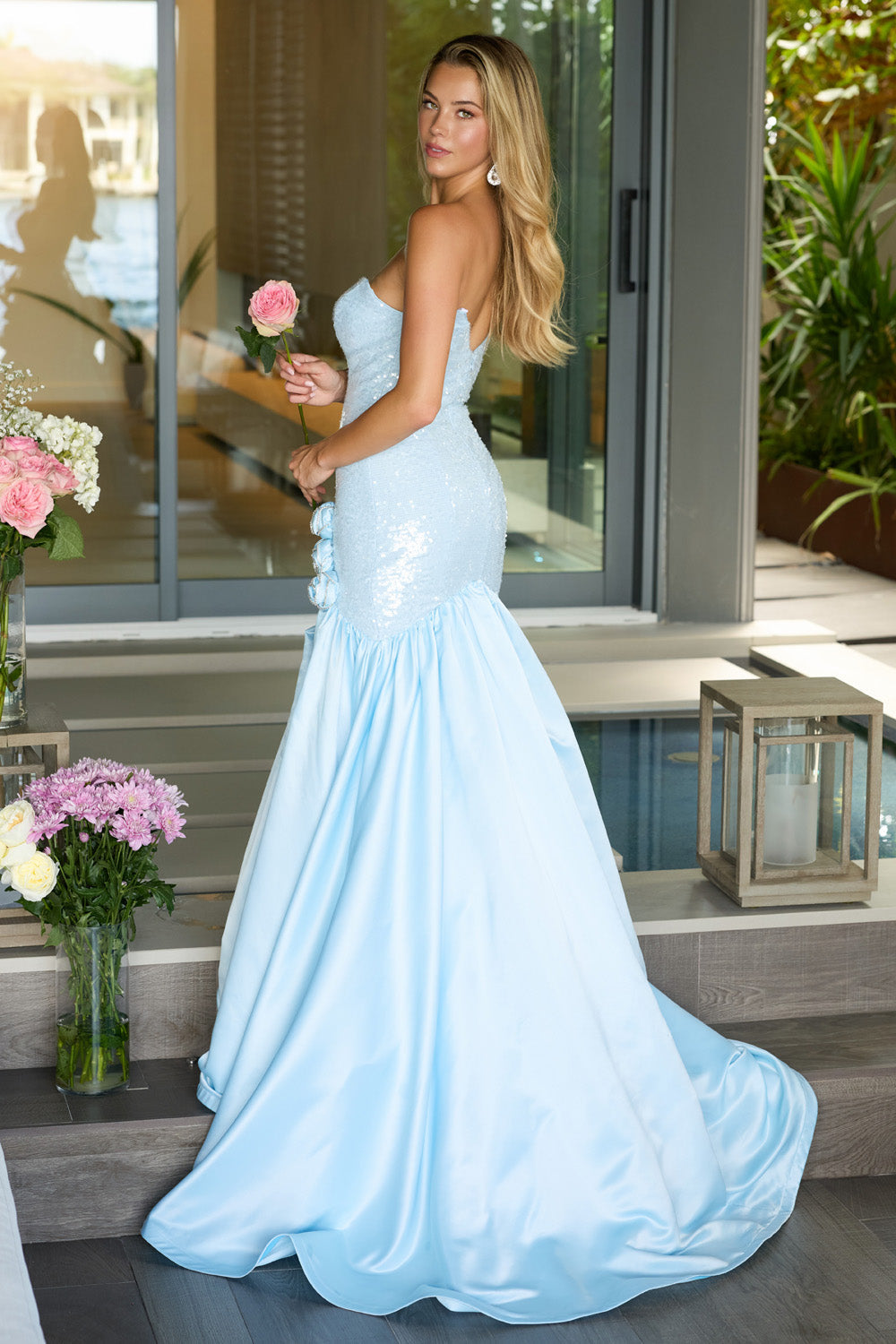 Ava Presley 26520 Light blue mermaid prom dress with sequins and a dramatic train, back view.
