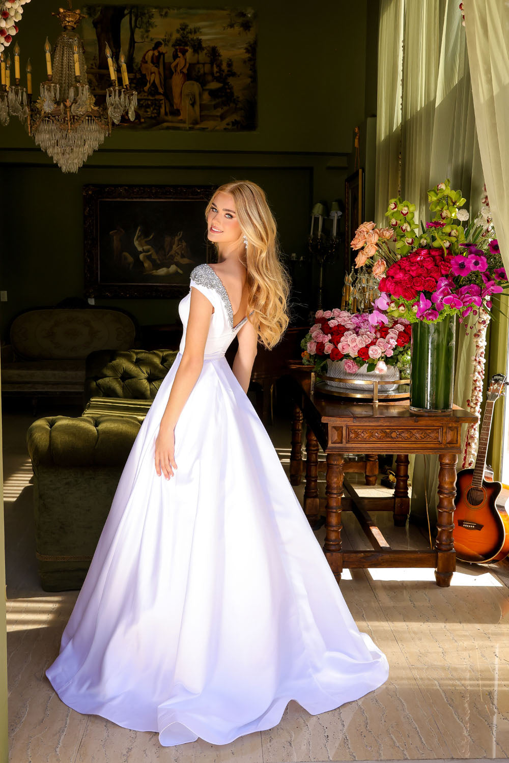 Ava Presley 39322 prom dress images. Ava Presley 39322 is available in these colors: White, Sky Blue, Orchid, Red.