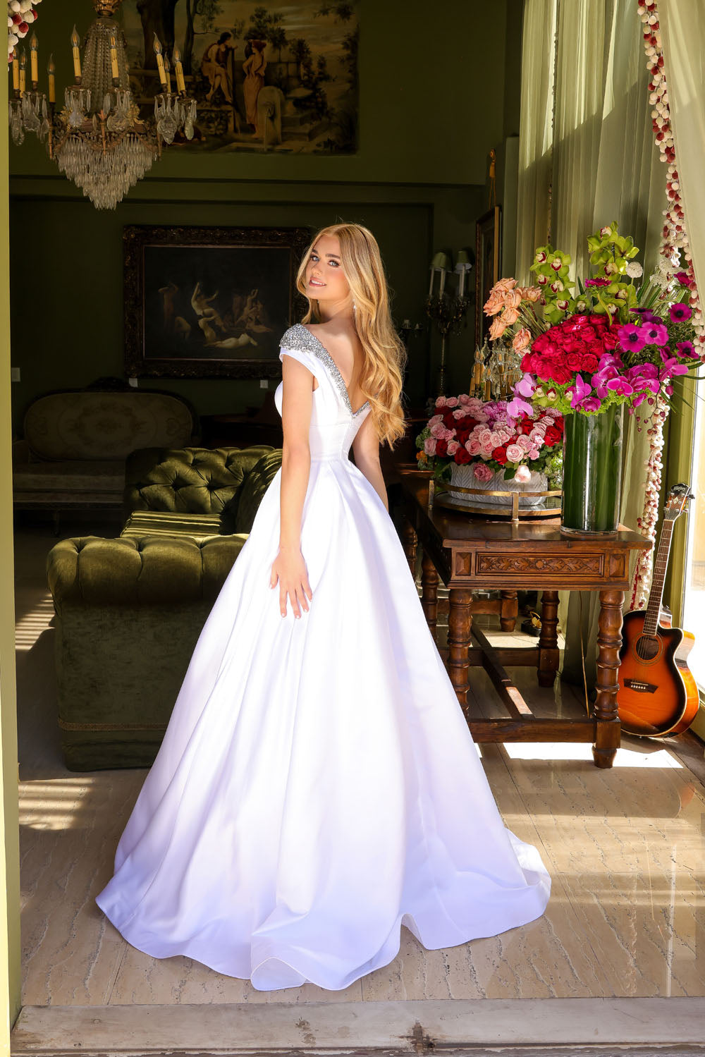 Ava Presley 39322 prom dress images. Ava Presley 39322 is available in these colors: White, Sky Blue, Orchid, Red.