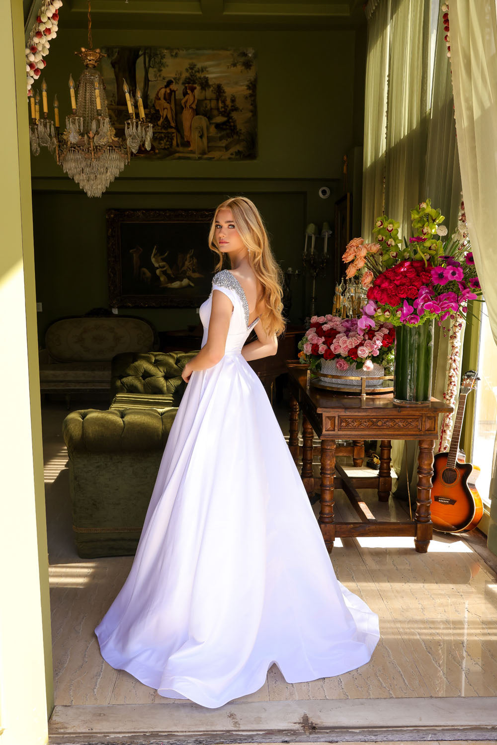 Ava Presley 39322 prom dress images. Ava Presley 39322 is available in these colors: White, Sky Blue, Orchid, Red.