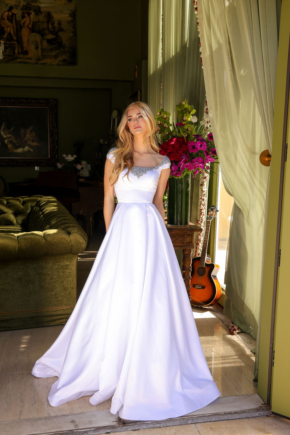 Ava Presley 39322 prom dress images. Ava Presley 39322 is available in these colors: White, Sky Blue, Orchid, Red.