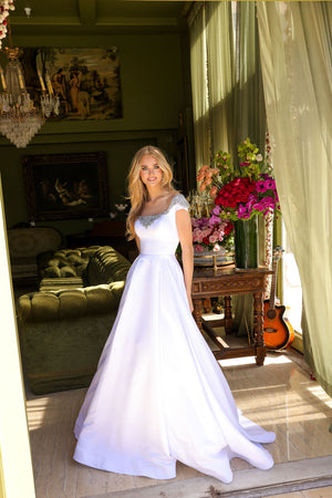 Ava Presley 39322 prom dress images.  Ava Presley 39322 is available in these colors: White, Sky Blue, Orchid, Red.