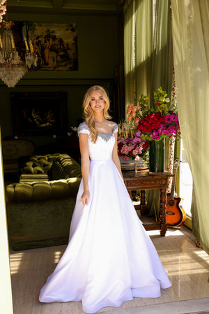 Ava Presley 39322 prom dress images.  Ava Presley 39322 is available in these colors: White, Sky Blue, Orchid, Red.
