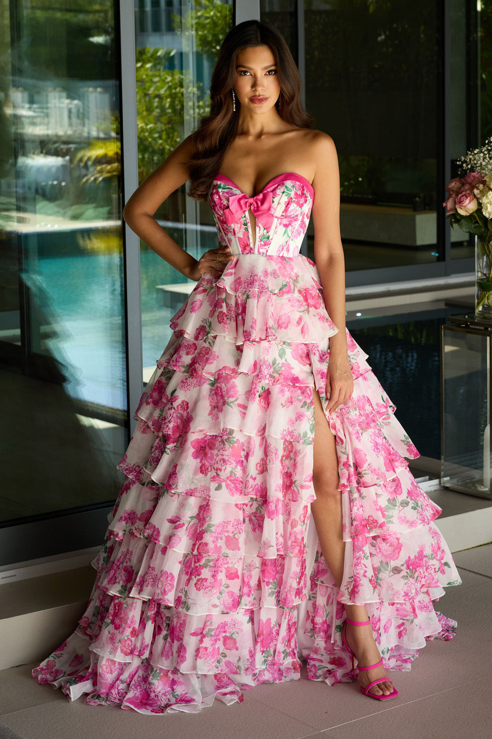 Ava Presley 42207 White and pink floral prom dress with a high slit and tiered ruffle skirt.