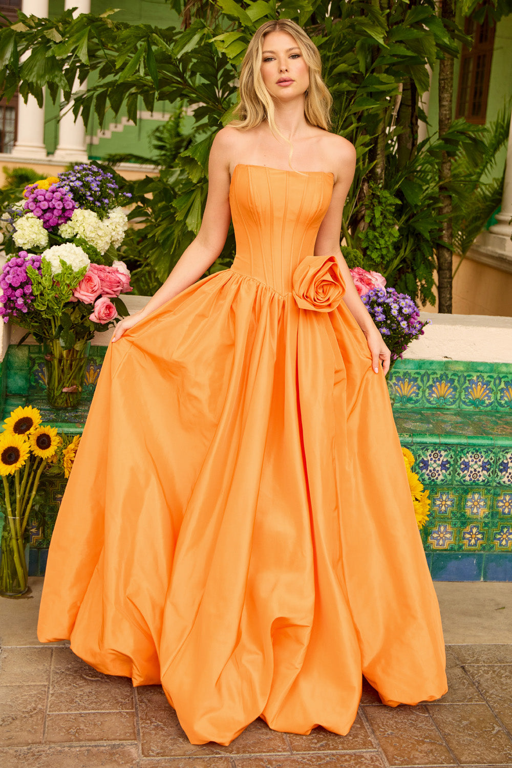 Ava Presley 47204 Strapless orange ballgown with a floral accent and full skirt, perfect for prom prom dress.