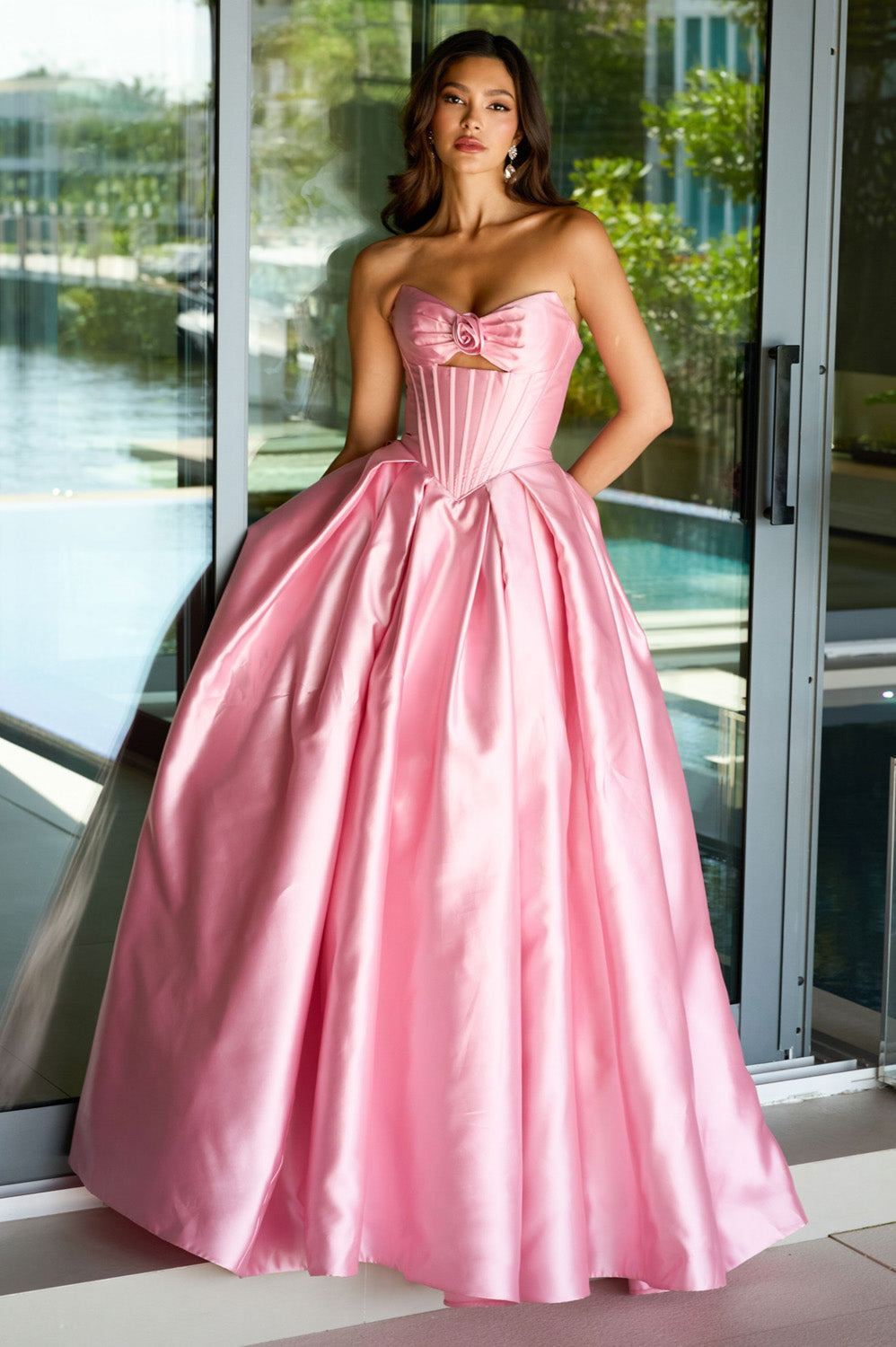 Ava Presley 47223 Blush ballgown prom dress with a sweetheart neckline and bow detail.