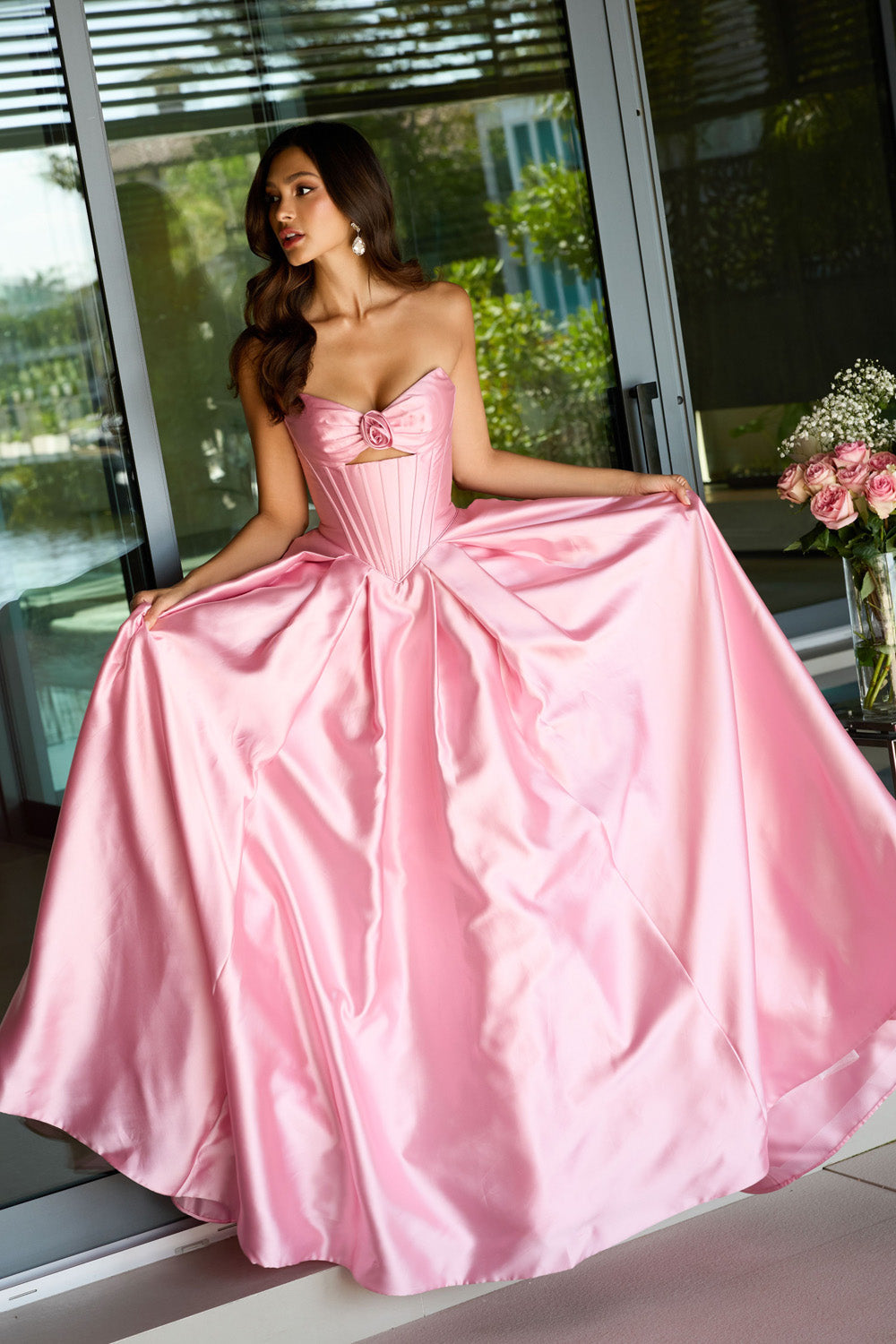 Ava Presley 47223 Blush ballgown prom dress with a corset bodice and floral detail.