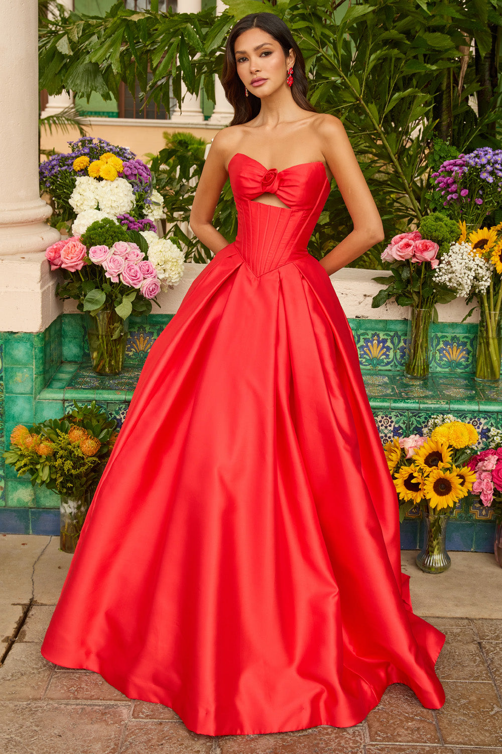 Ava Presley 47223 Red ballgown prom dress with a bow detail and fitted bodice, front view.