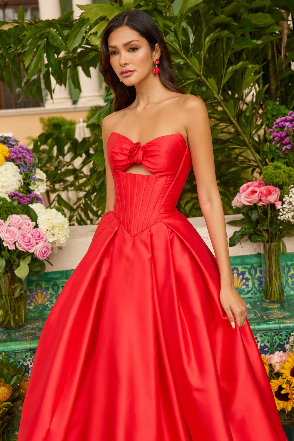 Ava Presley 47223 Red A-line prom dress with a bow detail and structured bodice, front view.