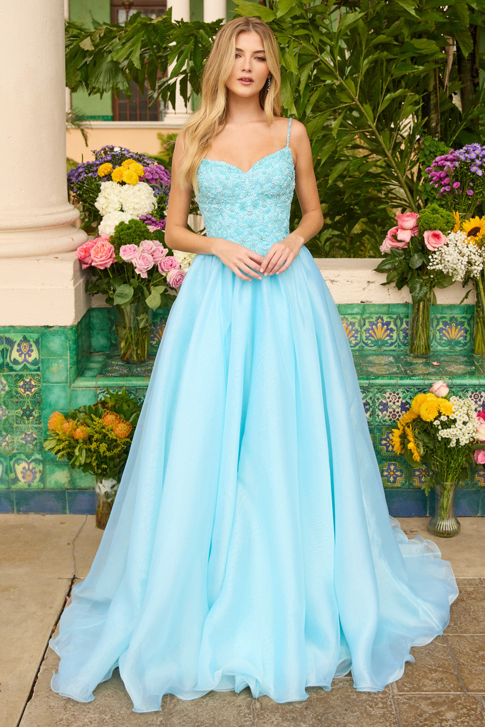 Ava Presley 47242 Light blue A-line prom dress with beaded bodice and flowing skirt.