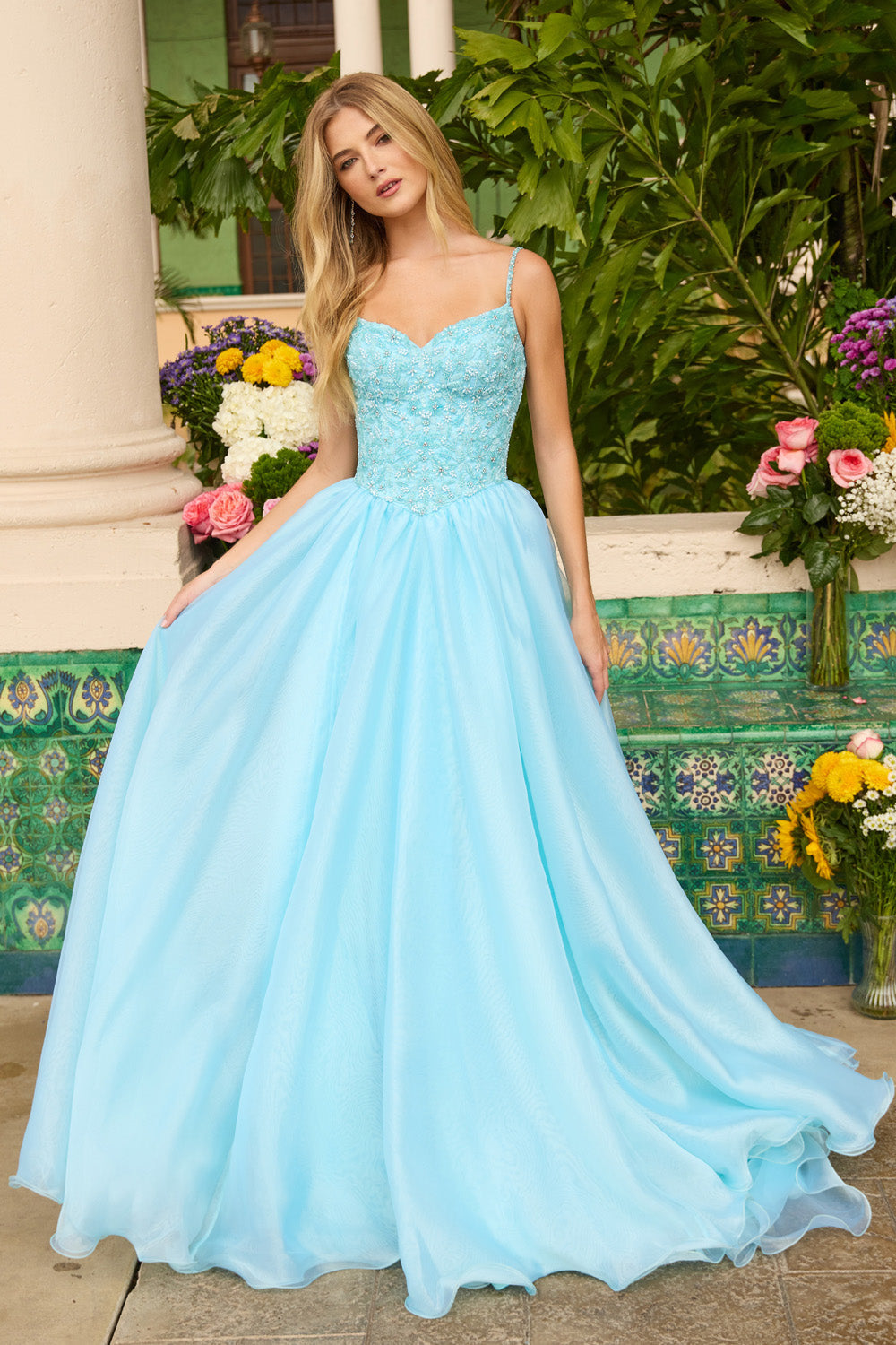 Ava Presley 47242 Light blue A-line prom dress with beaded bodice and flowing skirt.