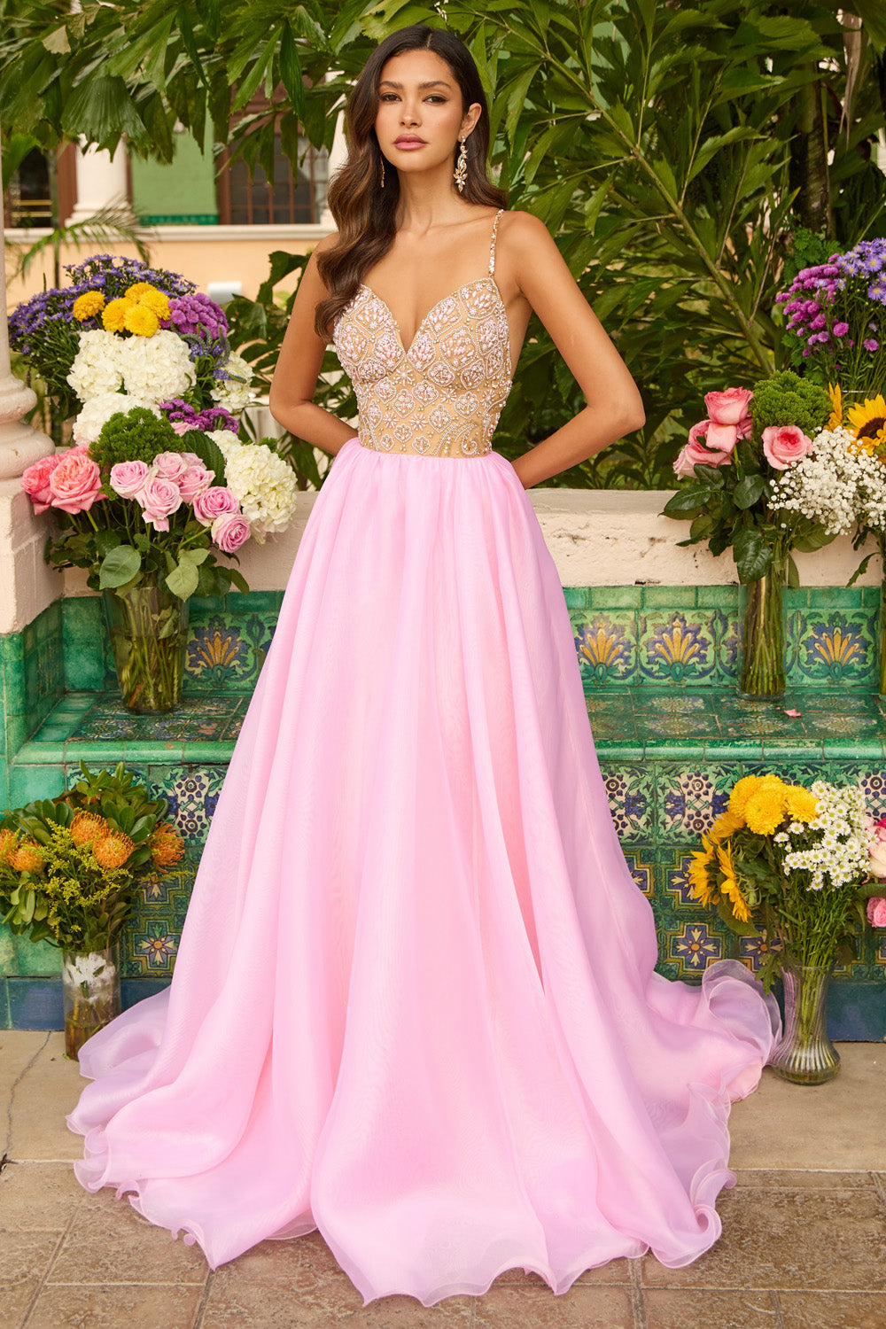 Ava Presley 47243 Nude light pink A-line prom dress with beaded bodice and flowing skirt.