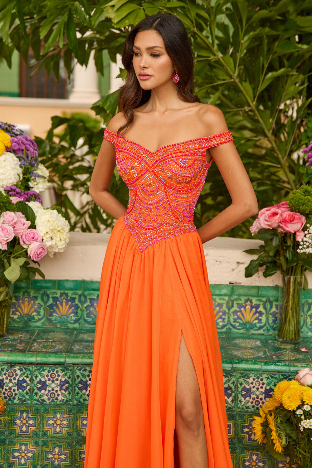 Ava Presley 47254 Off-the-shoulder orange prom dress with beaded bodice and side slit.