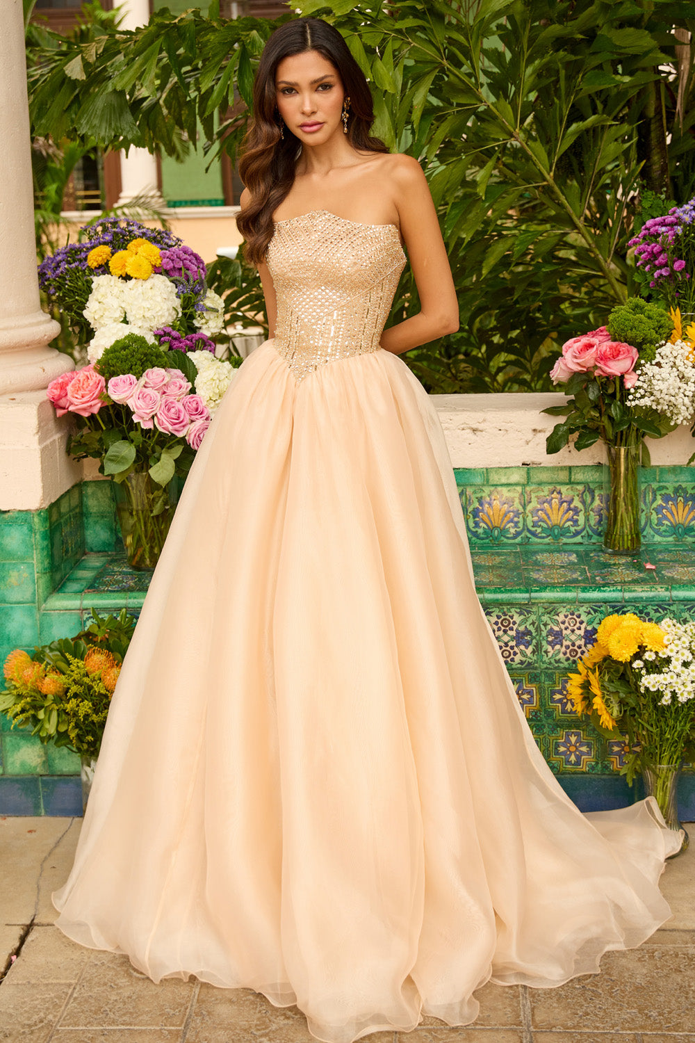 Ava Presley 47255 Strapless gold prom dress with beaded bodice and flowing A-line skirt.