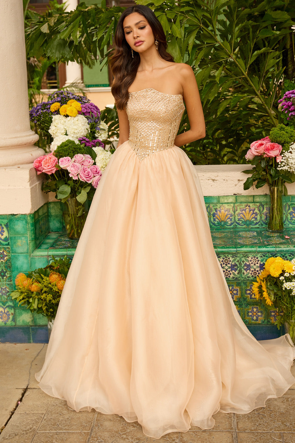 Ava Presley 47255 Strapless gold prom dress with beaded bodice and flowing A-line skirt.