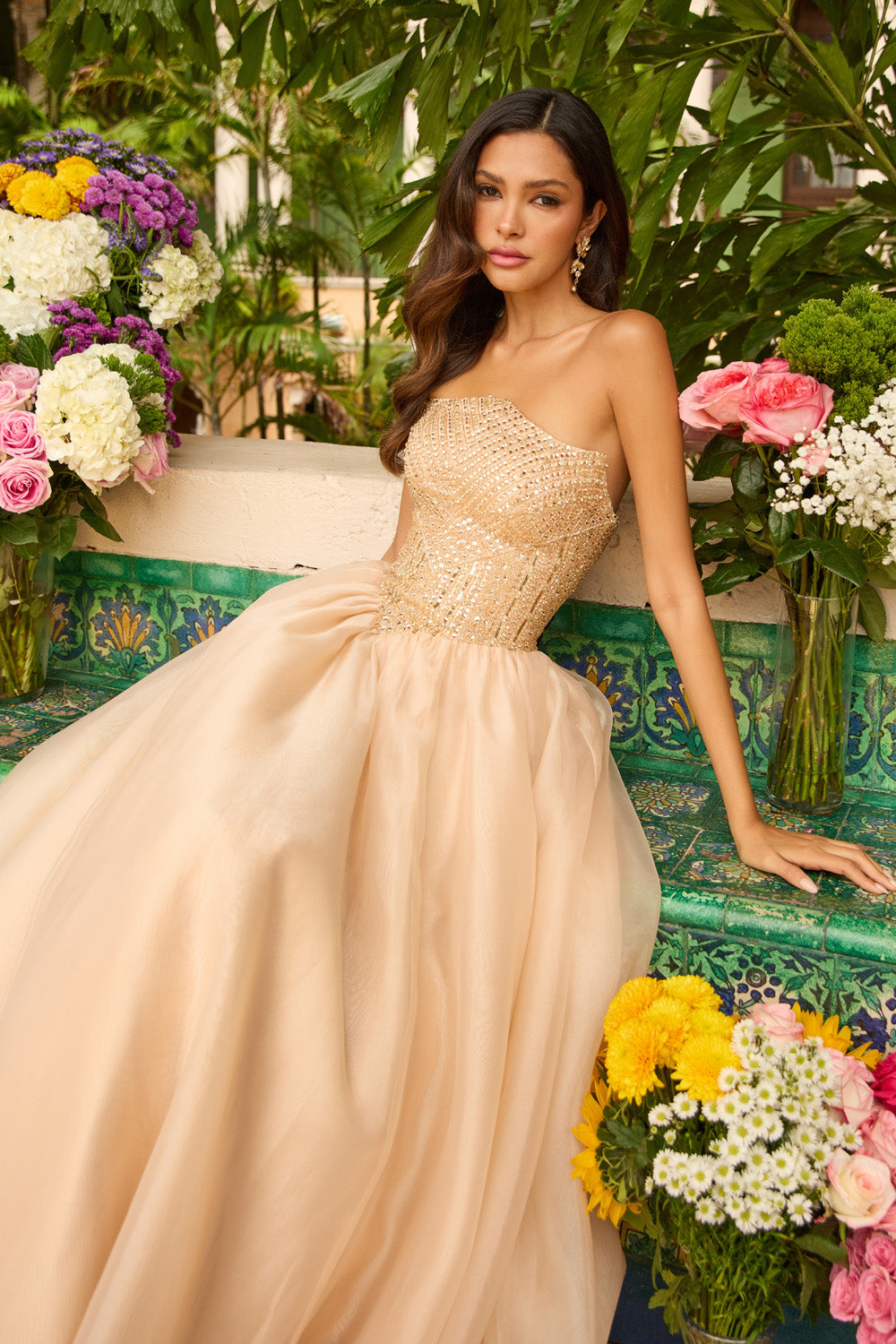 Ava Presley 47255 Strapless gold prom dress with beaded bodice and flowing A-line skirt.