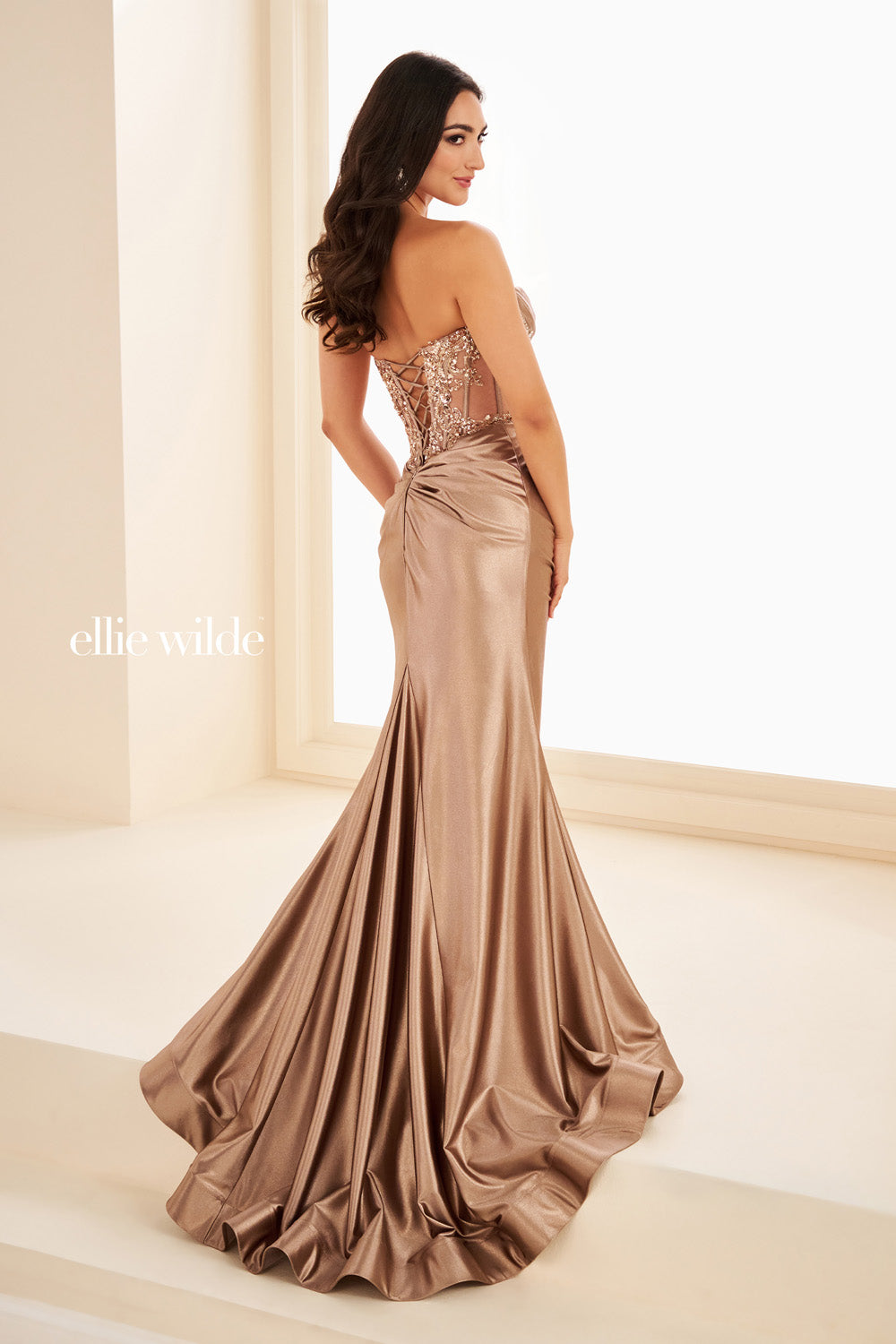 Ellie Wilde EW37014 metallic bronze, fitted silhouette, lace up back detail prom dress images.