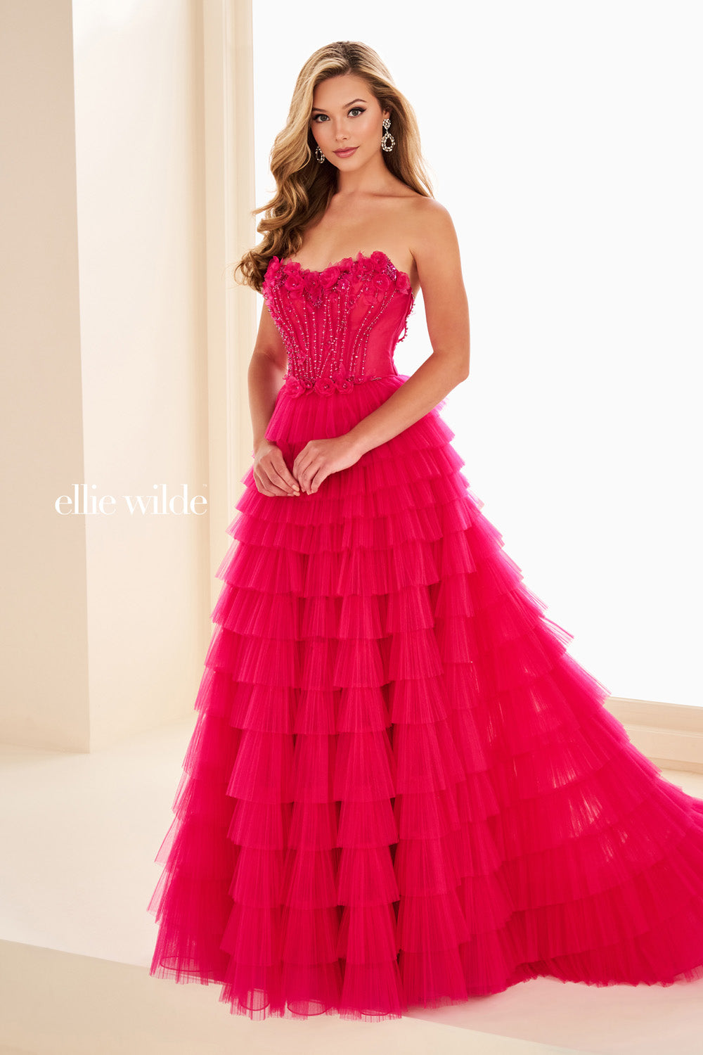 Ellie Wilde EW37026 bright pink, strapless, tiered tulle silhouette prom dress images.