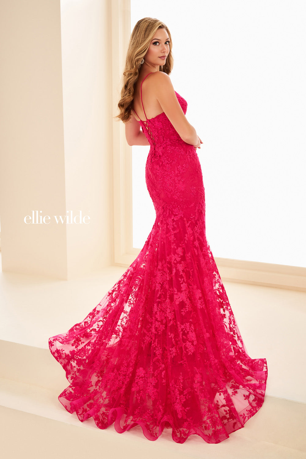 Ellie Wilde EW37027 hot pink, fitted silhouette, lace detailing prom dress images.