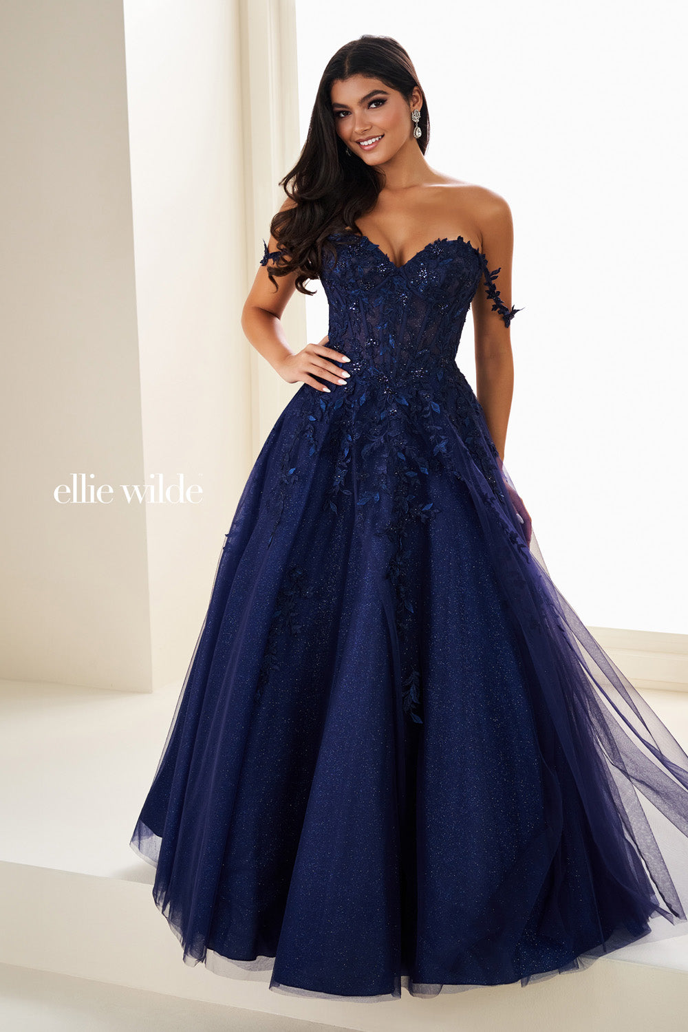 Ellie Wilde EW37028 navy blue, ball gown silhouette, floral embellishments prom dress images.