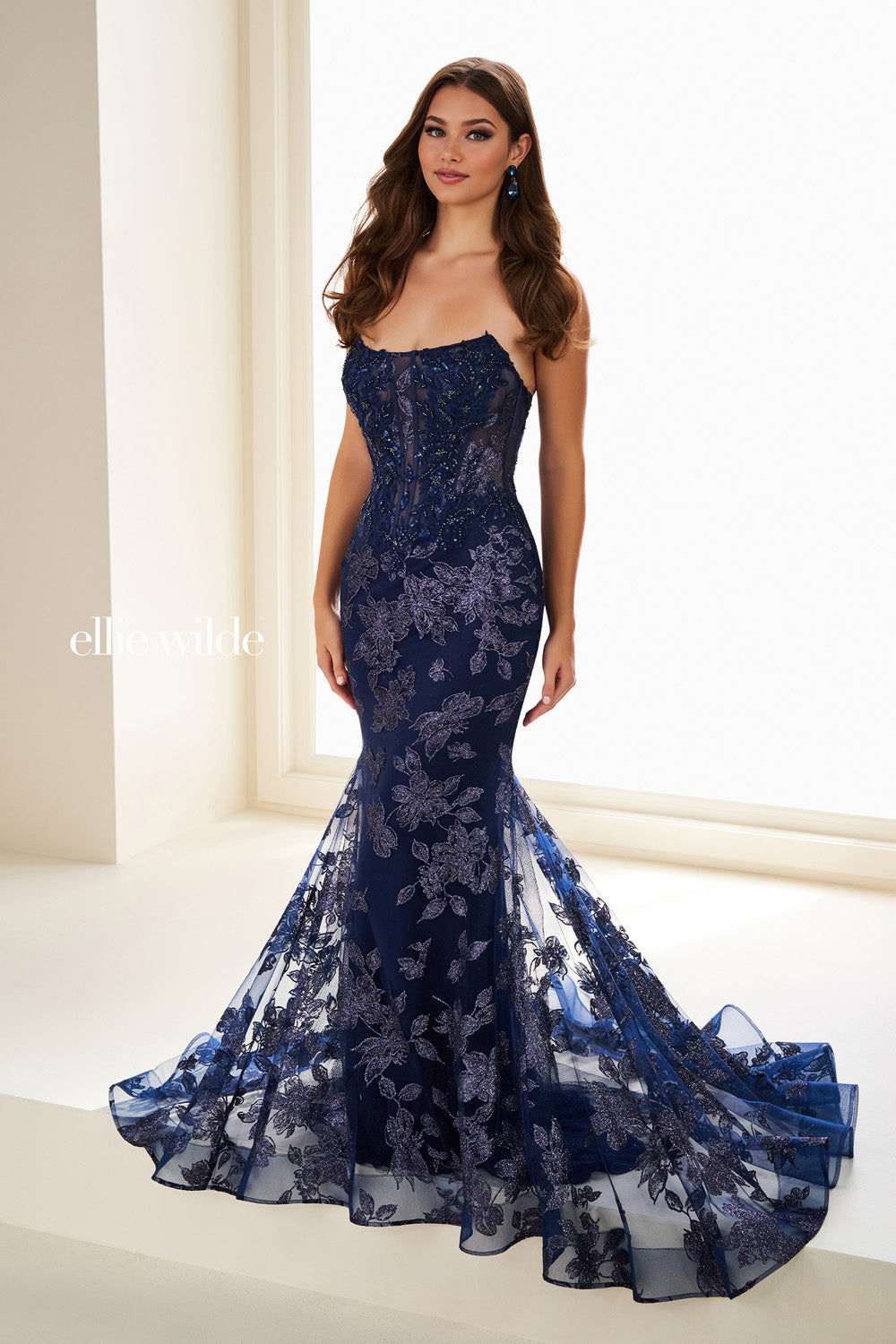 Ellie Wilde EW37083 navy blue, mermaid silhouette, floral lace detailing prom dress images.