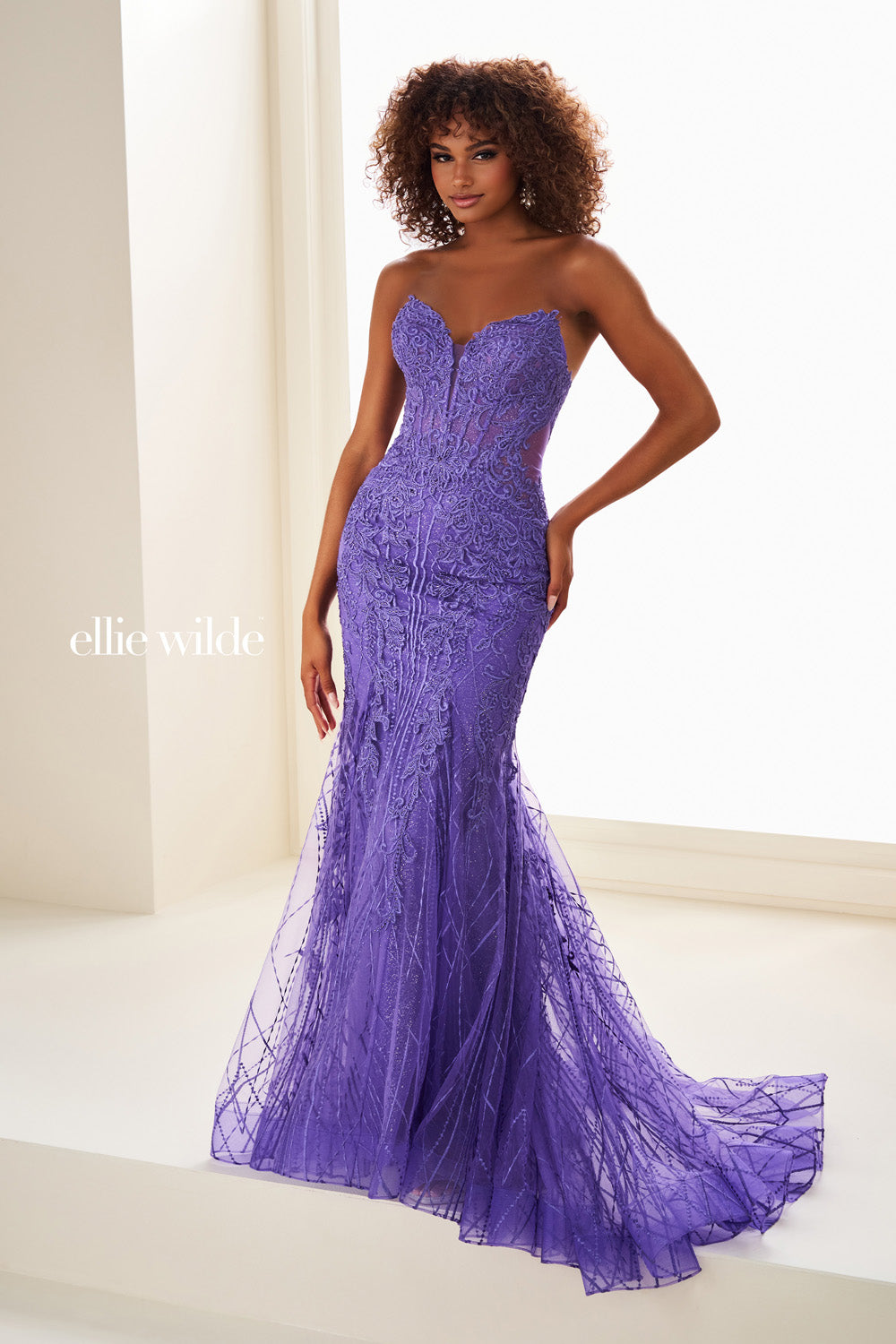 Ellie Wilde EW37114 purple mermaid dress with intricate lace detailing prom dress images.