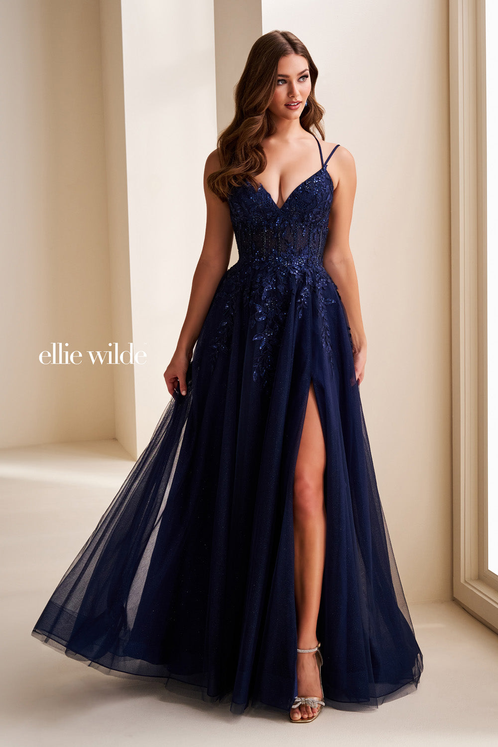 Ellie Wilde EW37212 navy blue, a line silhouette, thigh high slit prom dress images.