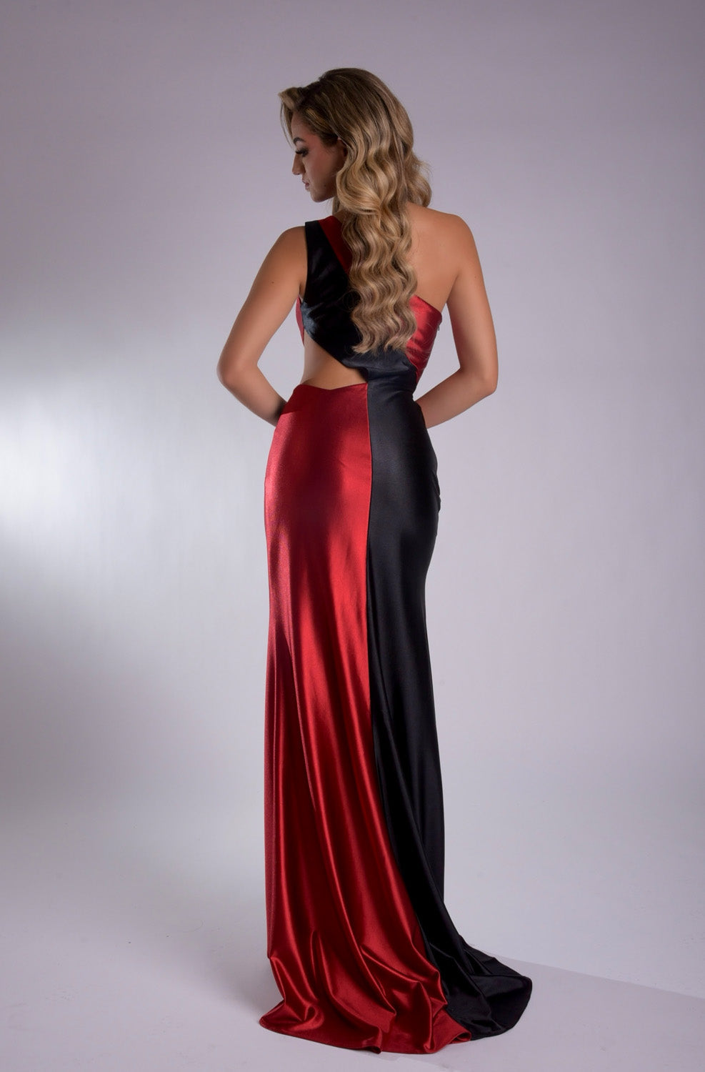 Jasz Couture 7907 Red and black mermaid prom dress with a stylish cutout back.