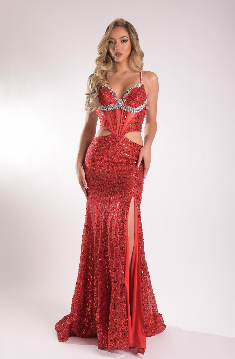 Jasz Couture 7916 Red mermaid prom dress with sequins and a thigh-high slit, front view.