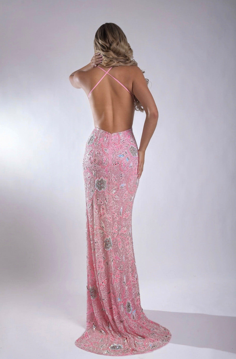 Jasz Couture 7923 Pink mermaid prom dress with intricate beading, featuring a backless design.