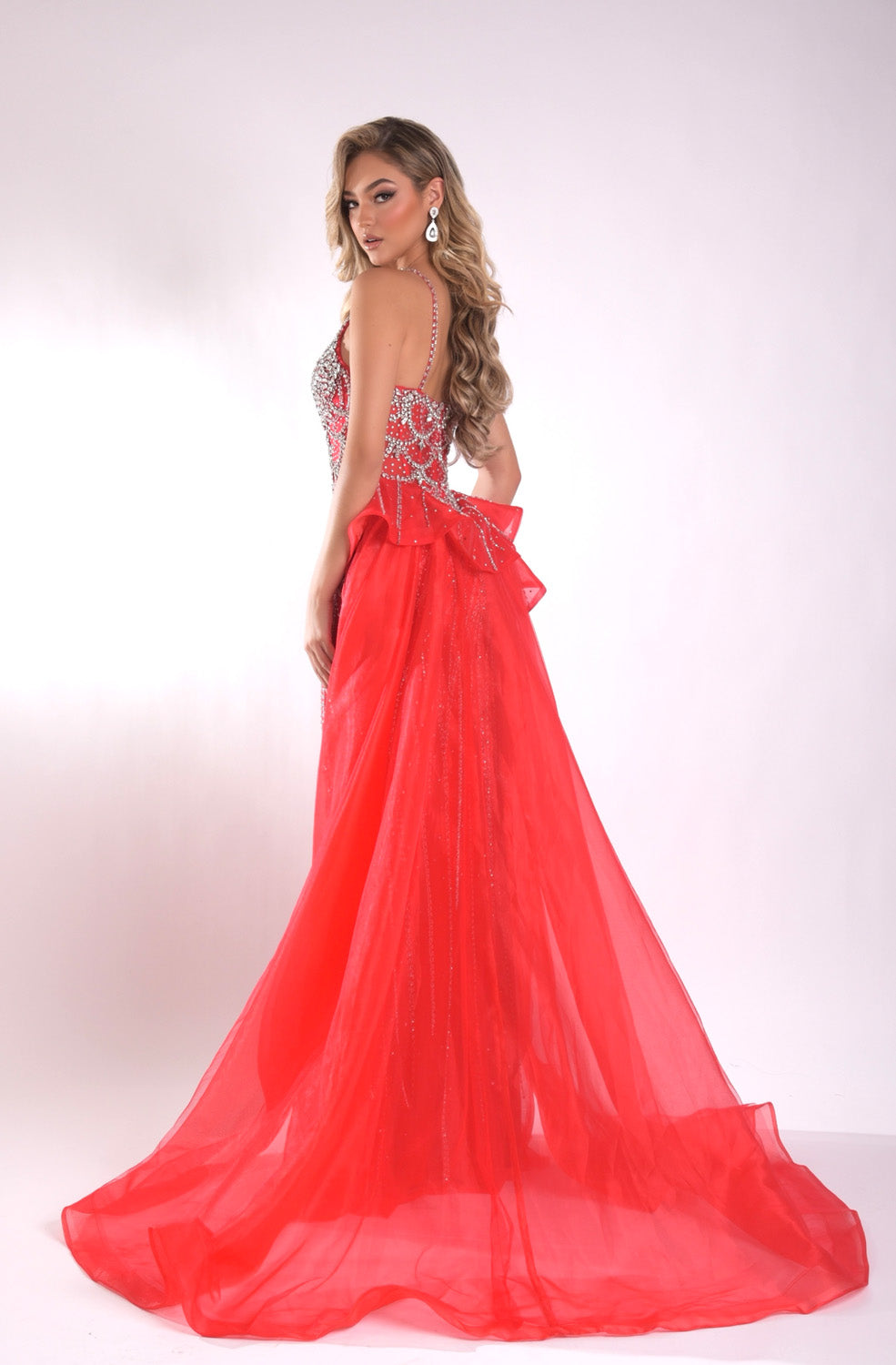 Jasz Couture 7946 Red mermaid prom dress with lace-up back and sparkling beading, back view.