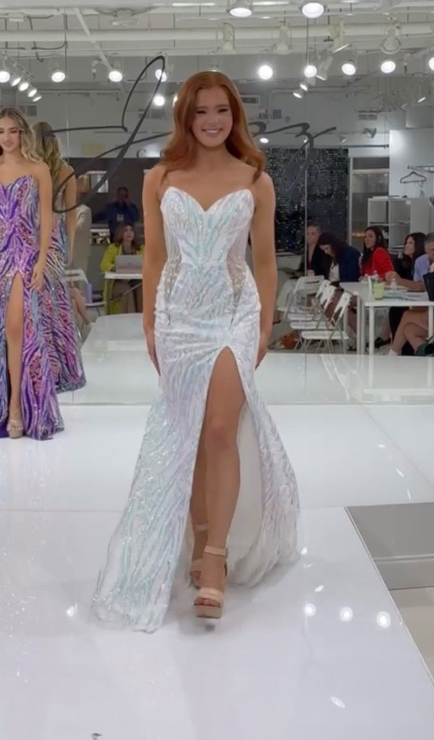 Jasz Couture 7949 White mermaid prom dress with a high slit and intricate lace detailing.