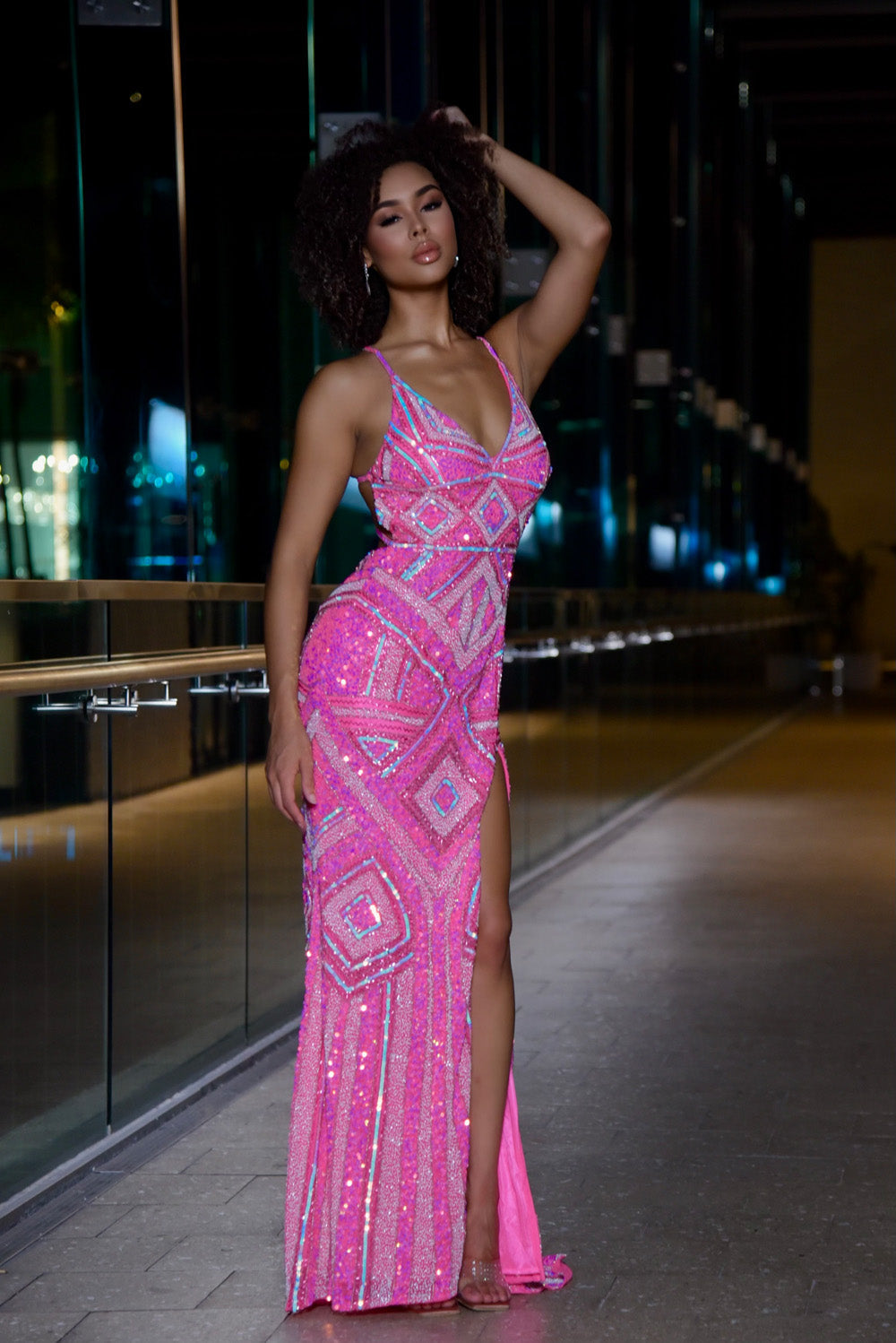 Jasz Couture 7950 Hot pink fitted prom dress with sequins and a thigh-high slit, front view.