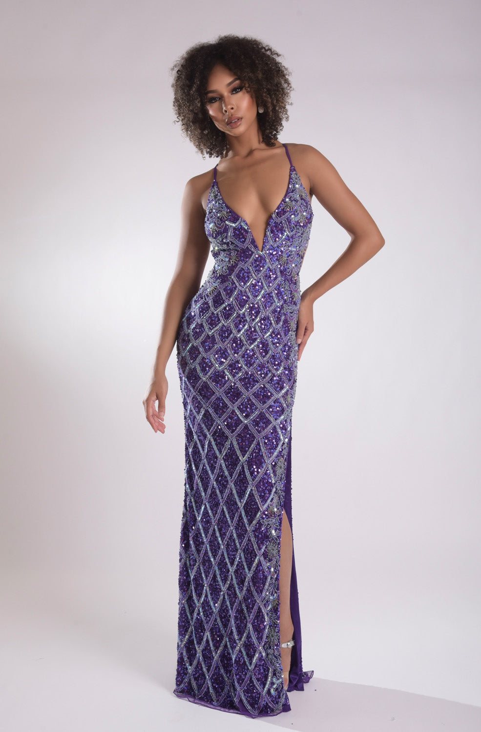 Jasz Couture 7953 Purple fitted prom dress with sequins and a thigh-high slit, front view.