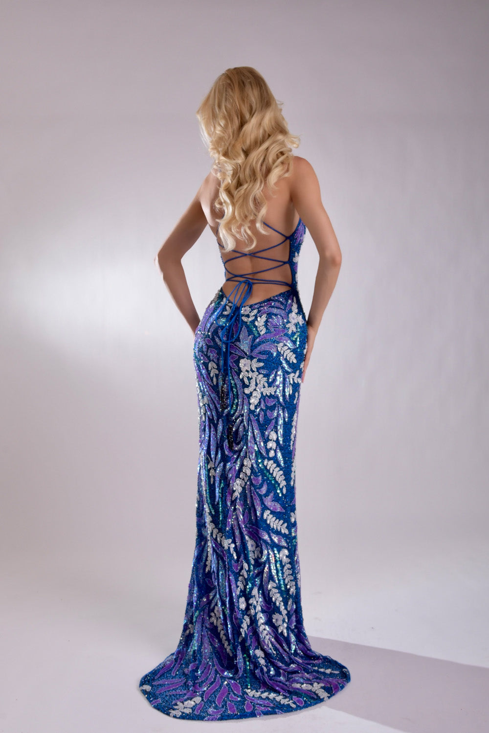 Jasz Couture 7972 Royal mermaid prom dress with lace-up back and intricate sequin detailing.
