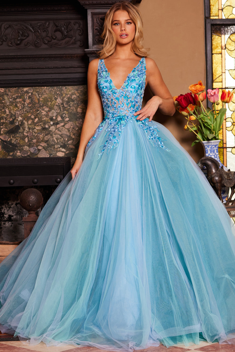 Jovani 23577 Blue multi A-line prom dress with intricate beading and a deep V neckline.