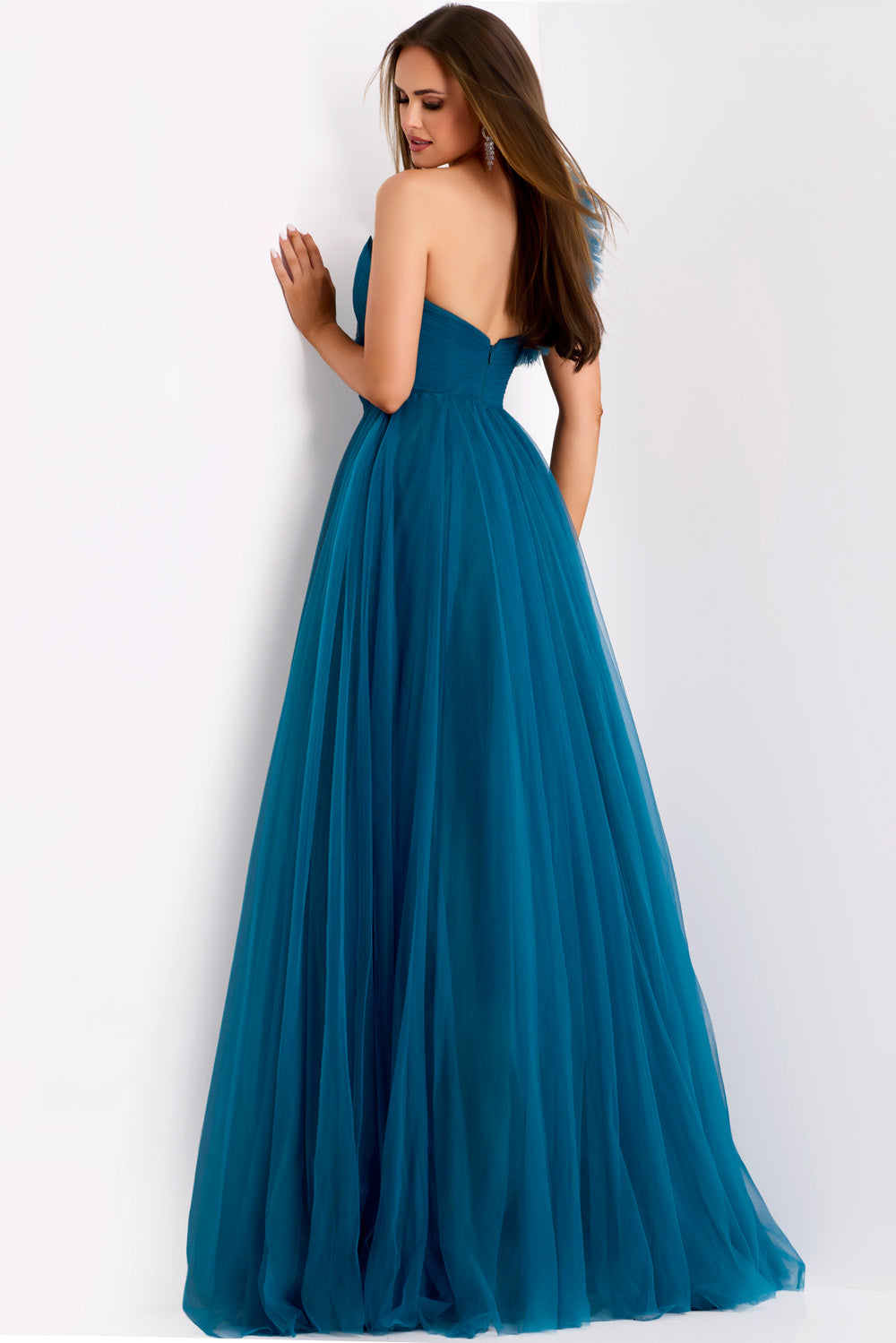 Jovani 25919 Teal A-line prom dress with a flowing skirt and a lace-up back, back view.
