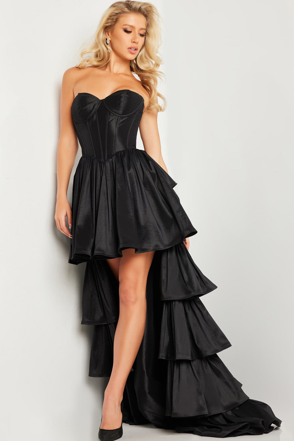 Jovani 26006 Black strapless prom dress with a tiered high-low skirt and corset bodice.