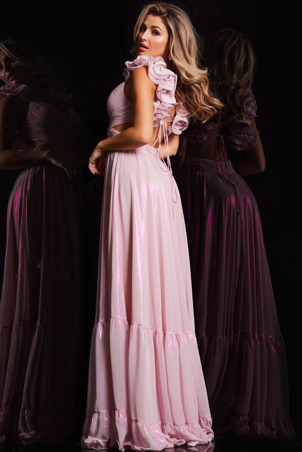Jovani 26248 Light pink formal gown with ruffled sleeves and a lace-up back, side view.