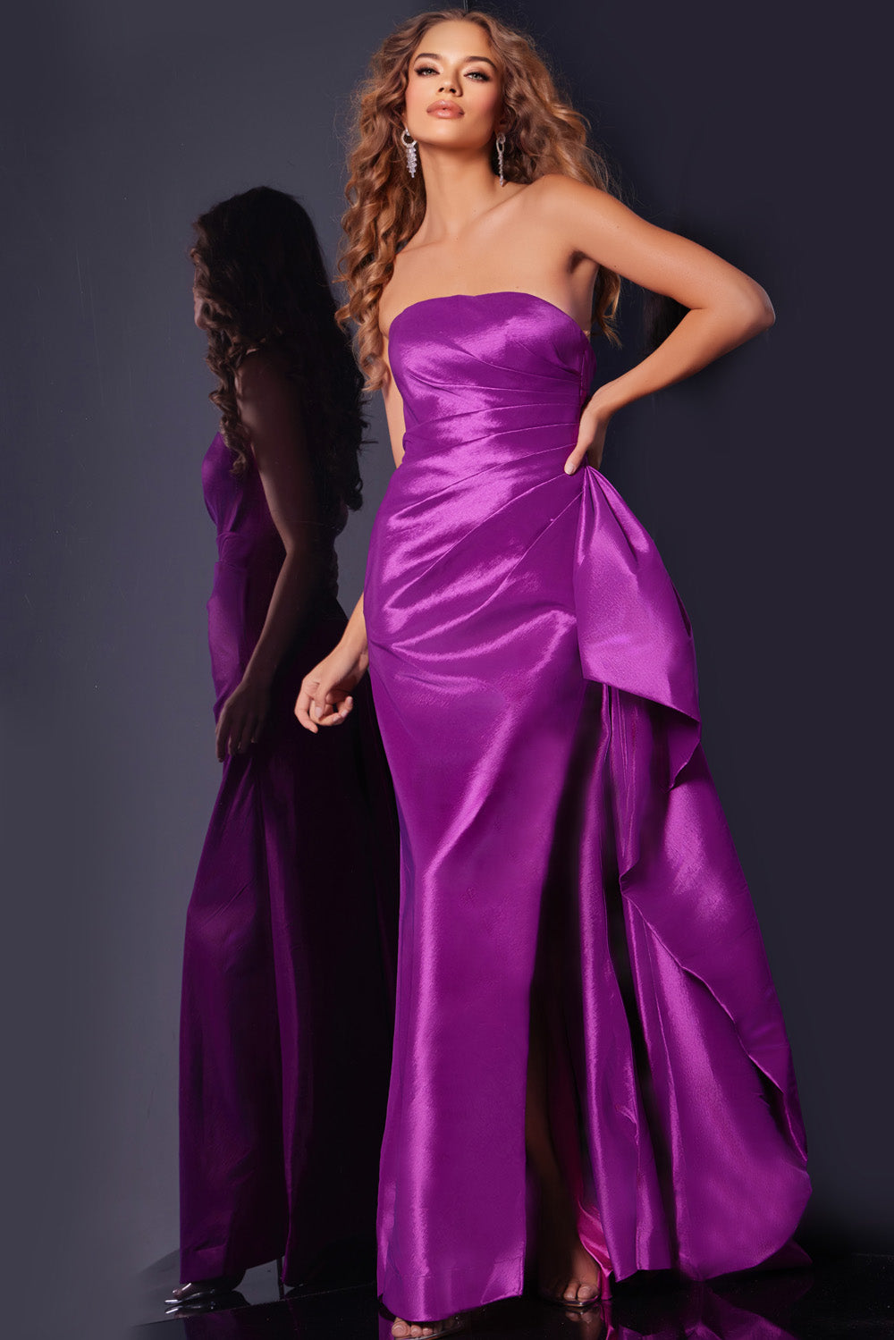 Jovani 36854 Purple mermaid prom dress with a side slit and elegant draped detail.