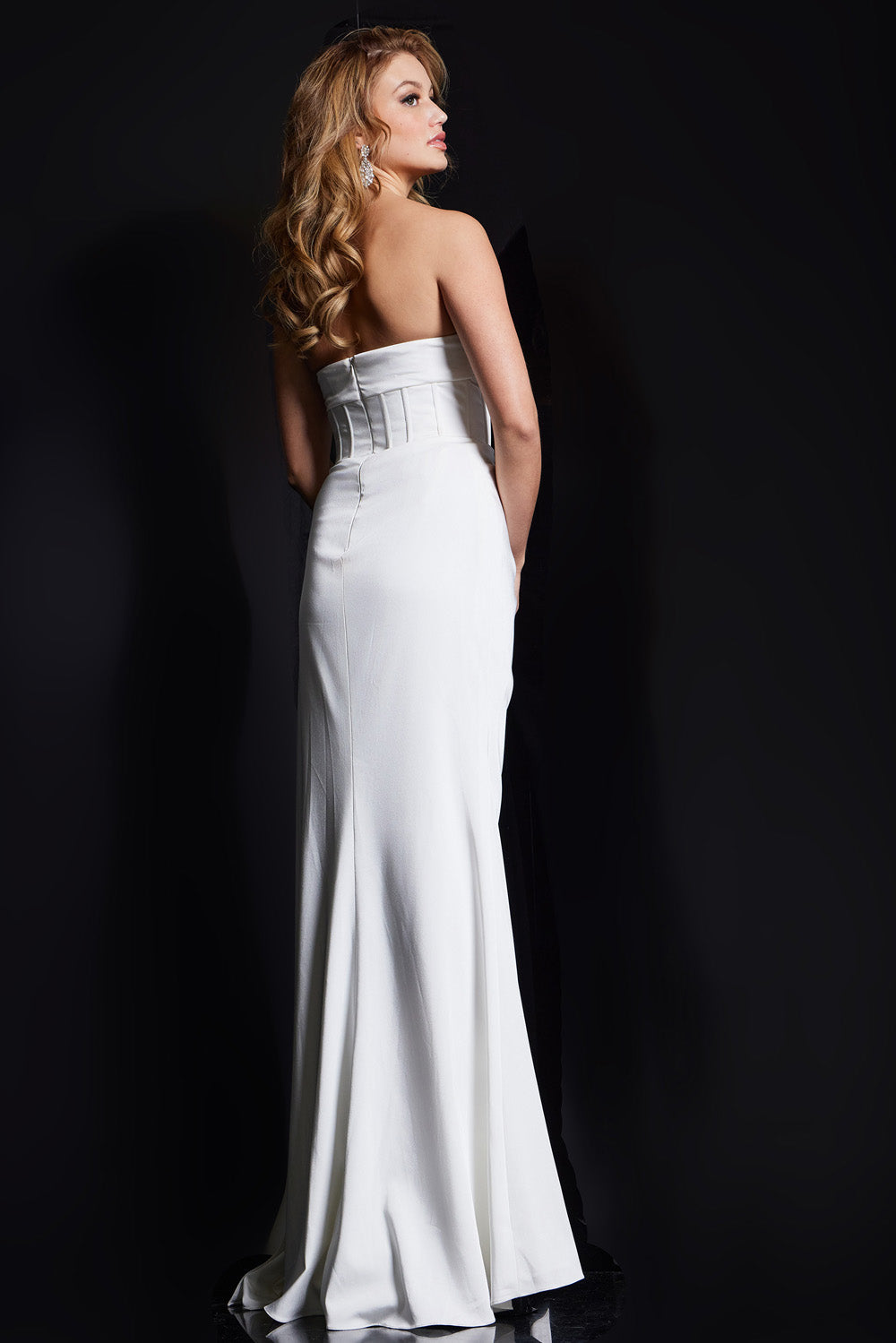 Jovani 36988 Strapless off-white mermaid prom dress with a sleek silhouette and lace-up back.