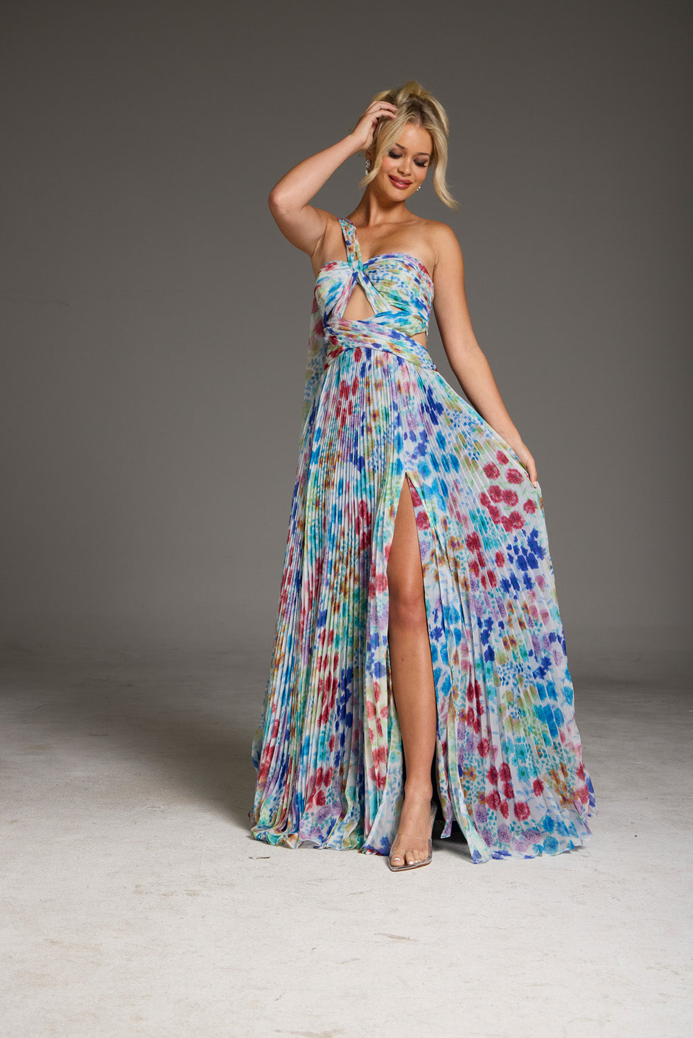 Jovani 38689 Colorful printed prom dress with a high slit and one-shoulder design, front view.