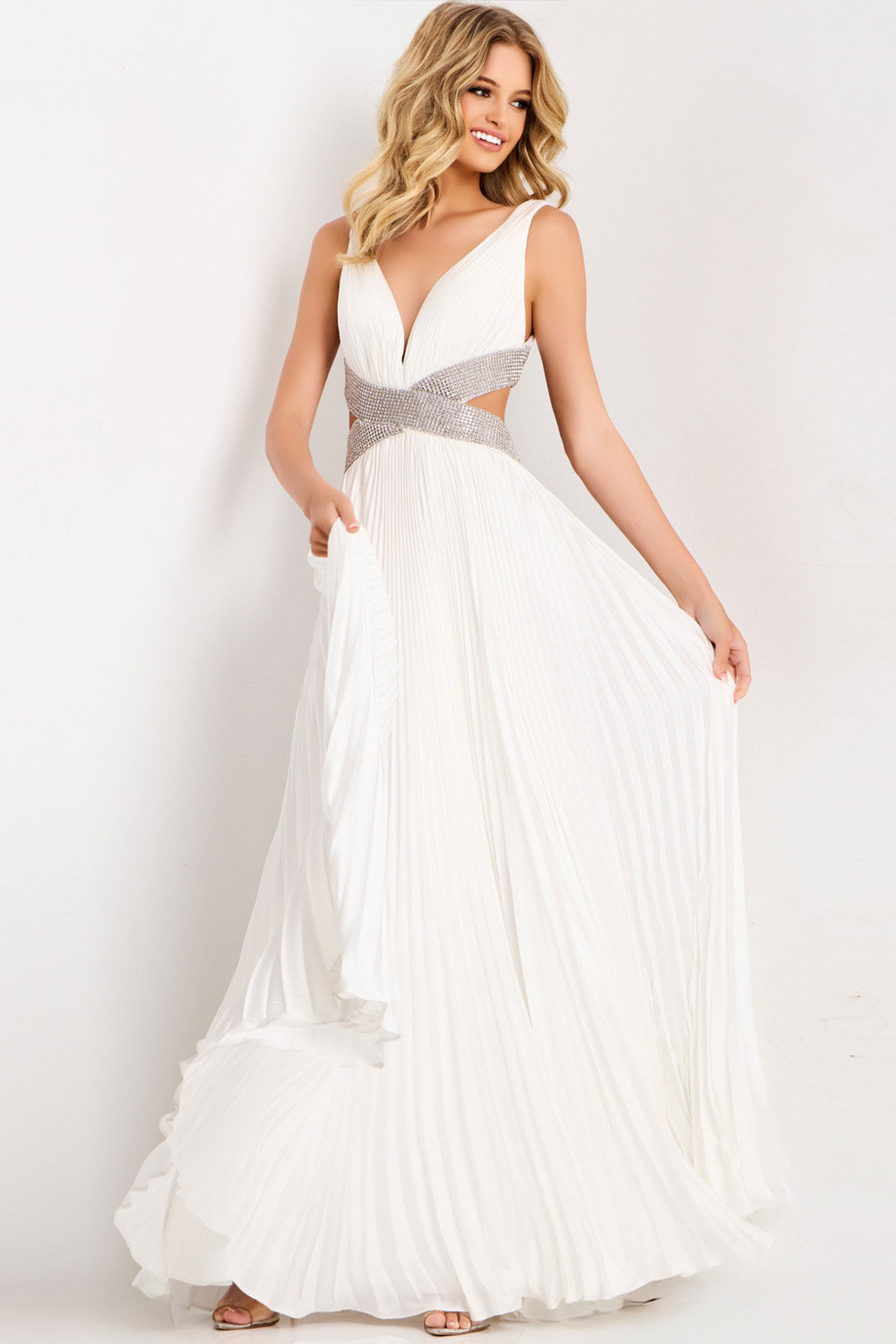 Jovani 42811 Off-white formal gown with pleated fabric and a beaded waist detail.
