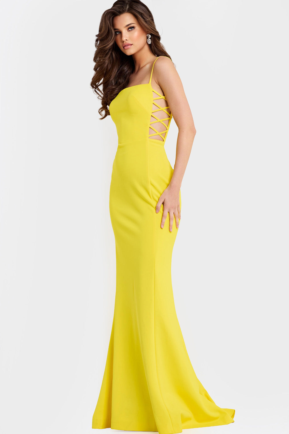 Jovani 43404 Yellow fitted prom dress with a lace-up back and mermaid silhouette.