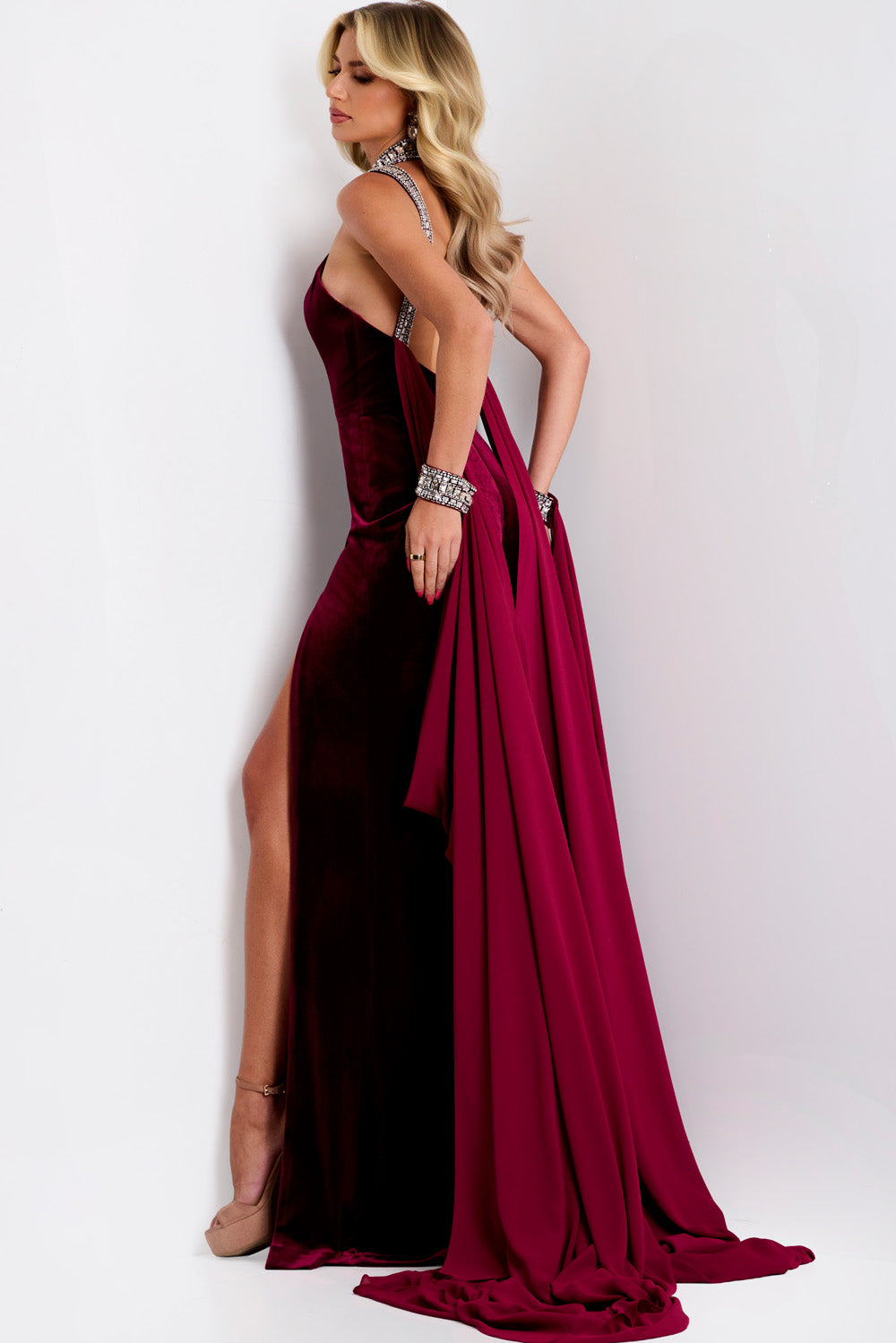 Jovani 43699 Burgundy mermaid prom dress with a side slit and embellished straps.