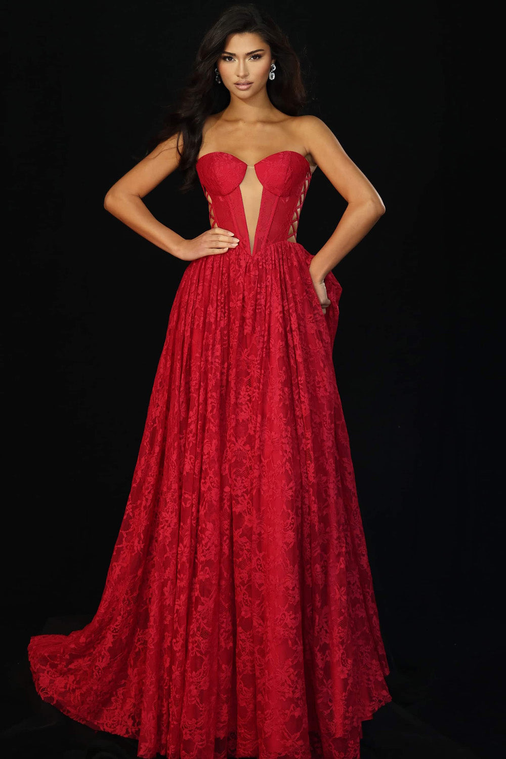 Jovani 45372 Red A-line prom dress with lace detailing and a plunging neckline, front view.