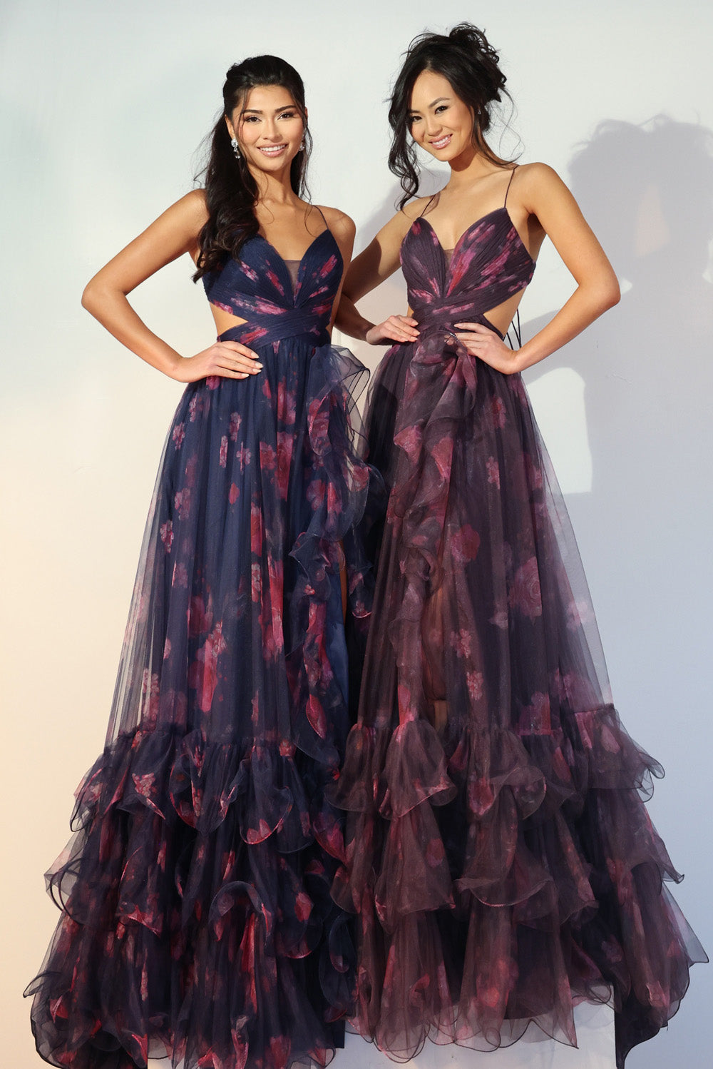Jovani 45712 Black and red printed A-line prom dress with ruffled layers and a side slit.