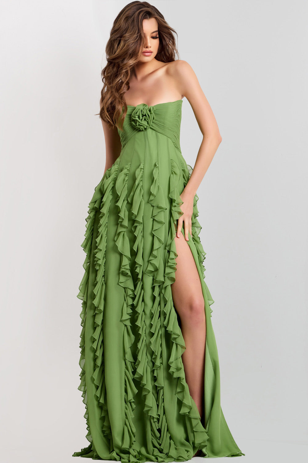 Jovani 46379 Light green prom dress with ruffled details and a thigh-high slit, front view.